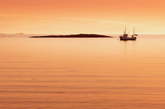 Sjark i solnedgang